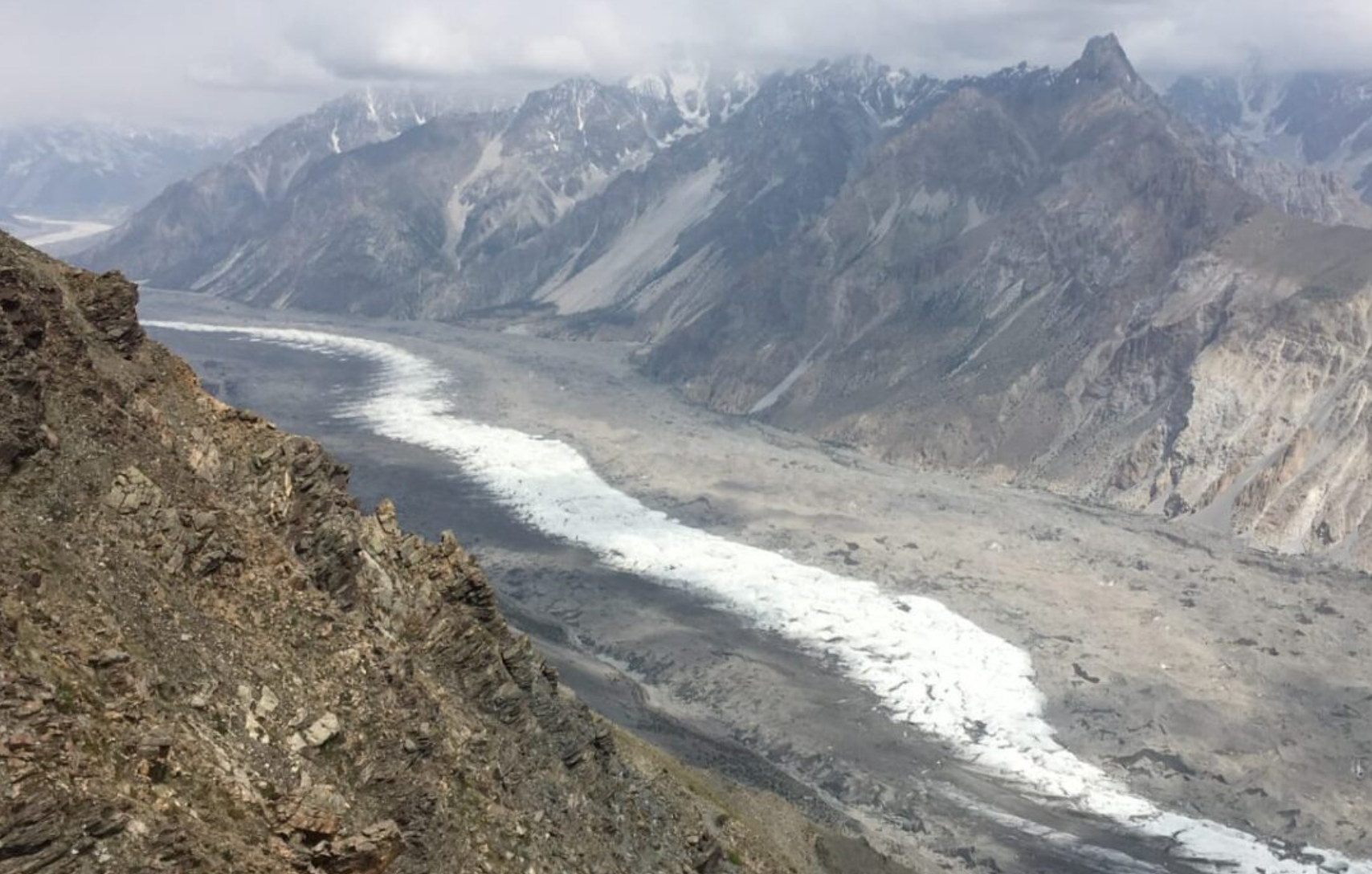 Hunza Valley green fields with glacier peaks Pakistan trekking